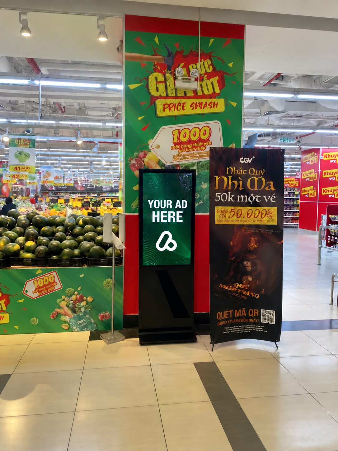 AdTRUE Global digital advertising display beside fresh produce at GO!